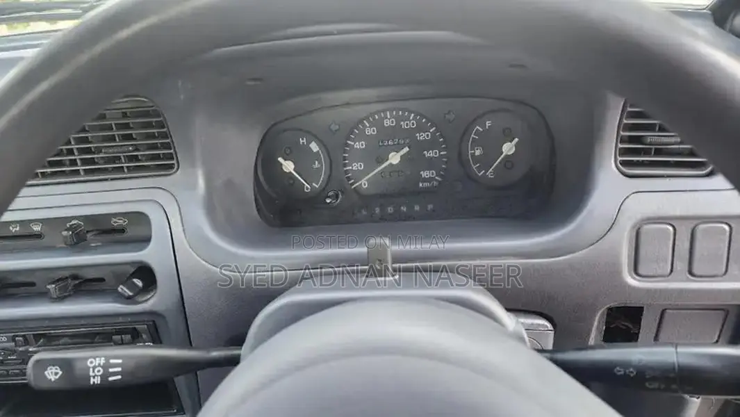 Daihatsu Coure 2005 Metallic Silver Compact Hatchback