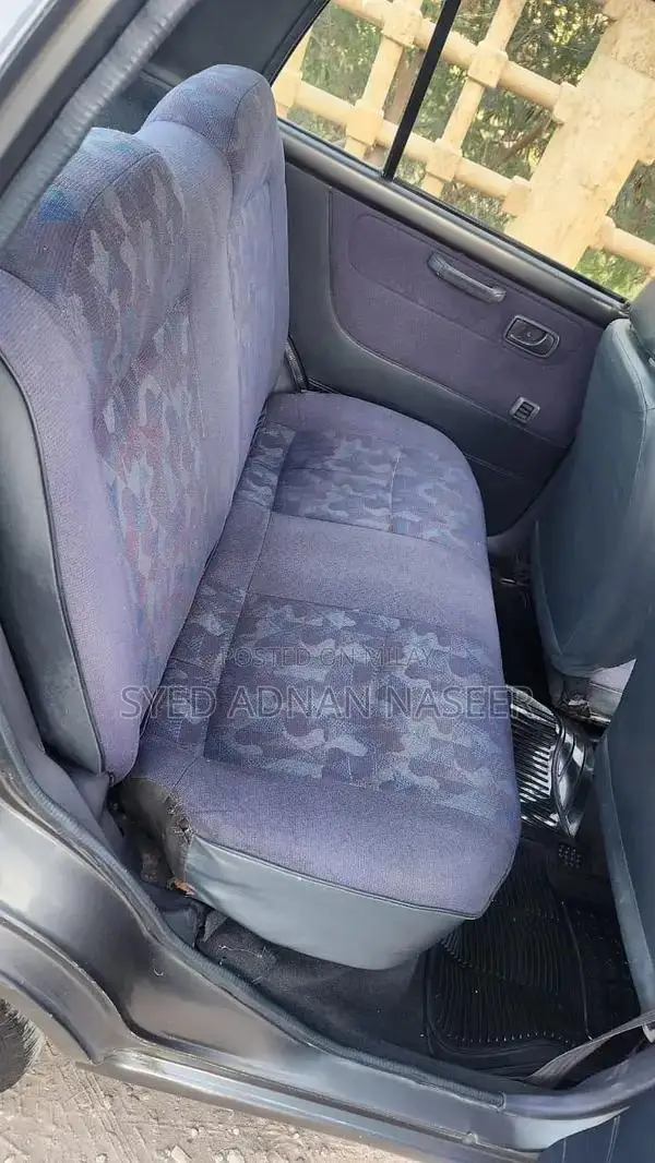 Daihatsu Coure 2005 Metallic Silver Compact Hatchback