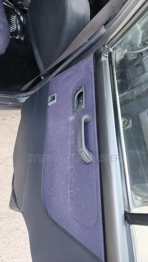 Daihatsu Coure 2005 Metallic Silver Compact Hatchback