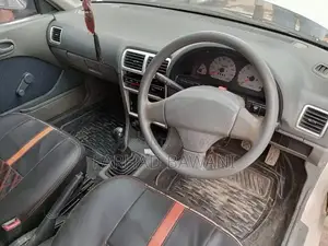 Photo - 2015 Suzuki Cultus VXRi - White Manual Transmission Sedan