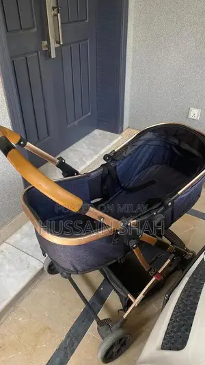 Photo - Infant to Toddler 2-in-1 Convertible Pram Stroller