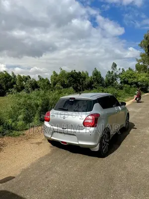 Photo - 2024 Suzuki Swift GLX-VVT Compact Sedan