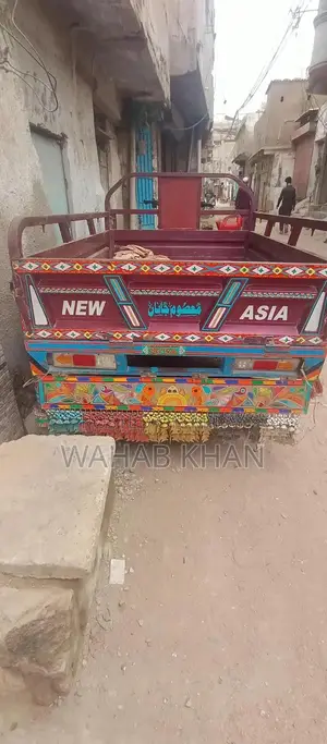 Photo - new asia loader richshaw.