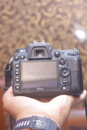 Nikon D7000 16MP DSLR Camera with 50mm f/1.8 Portrait Lens