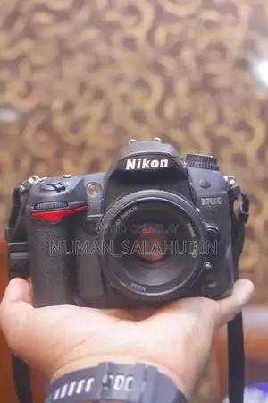 Nikon D7000 16MP DSLR Camera with 50mm f/1.8 Portrait Lens