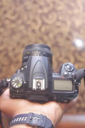 Nikon D7000 16MP DSLR Camera with 50mm f/1.8 Portrait Lens