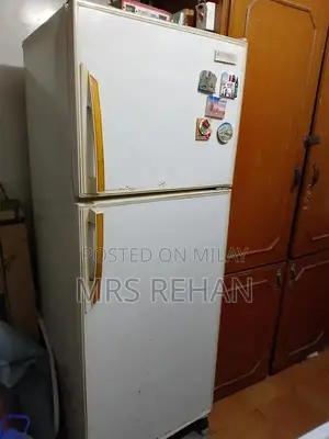 Photo - National Medium Off-White No-Frost Refrigerator with Freezer