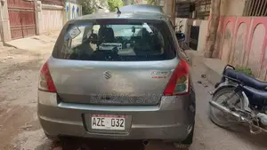 Photo - 2013 Suzuki Swift Sedan - Family Car with Excellent Condition