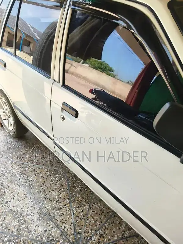 Mehran VXR Compact Sedan - Reliable Urban Compact Car