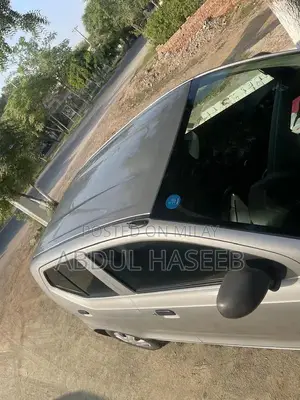 Alto VX Converted Compact Car with Bluetooth System