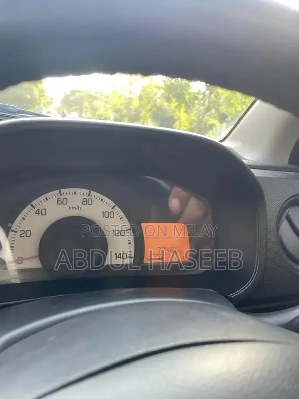 Alto VX Converted Compact Car with Bluetooth System