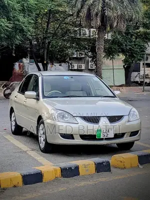 Photo - Mitsubishi Lancer - Well-Maintained Clean Sedan