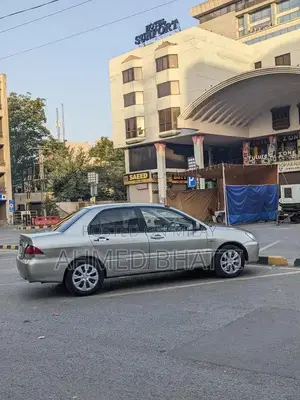 Mitsubishi Lancer - Well-Maintained Clean Sedan