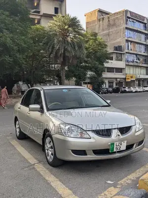 Mitsubishi Lancer - Well-Maintained Clean Sedan