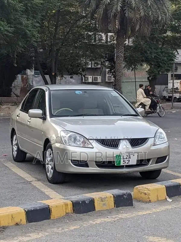 Mitsubishi Lancer - Well-Maintained Clean Sedan