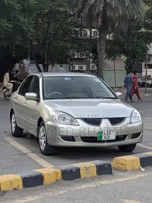 Mitsubishi Lancer - Well-Maintained Clean Sedan