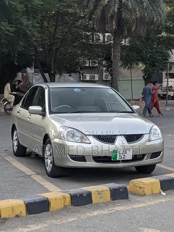 Mitsubishi Lancer - Well-Maintained Clean Sedan