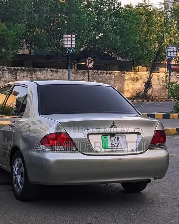 Mitsubishi Lancer - Well-Maintained Clean Sedan