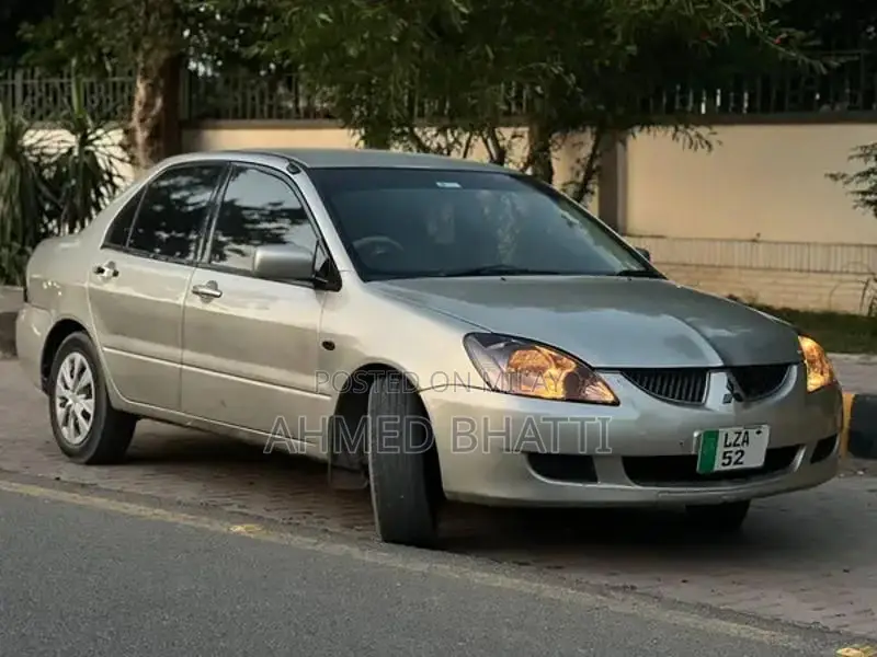 Mitsubishi Lancer - Well-Maintained Clean Sedan