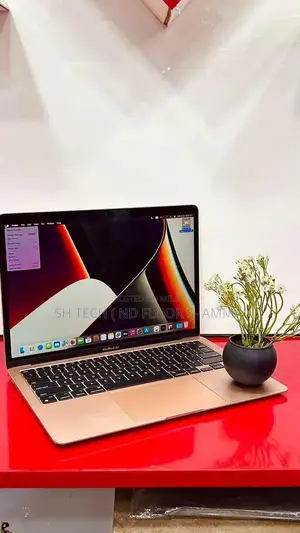 Photo - Apple MacBook Air M1 2020 Ultralight Laptop Rose Gold