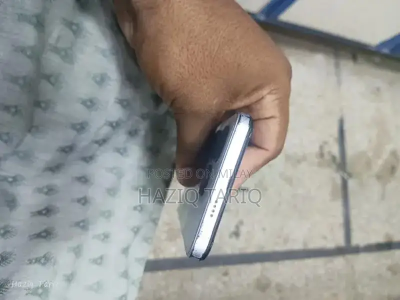 Budget-Friendly Smartphone with Glass Panel and Ample Storage