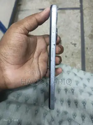 Budget-Friendly Smartphone with Glass Panel and Ample Storage