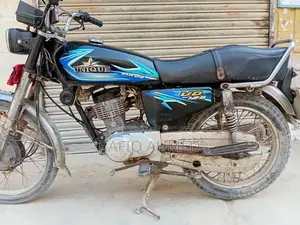 Unique 125cc Motorcycle - First Owner, Excellent Condition