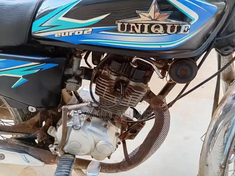Unique 125cc Motorcycle - First Owner, Excellent Condition