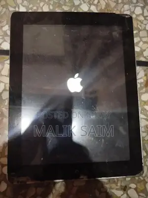 Photo - Apple iPad 4 Tablet with Touchscreen and Battery Issues