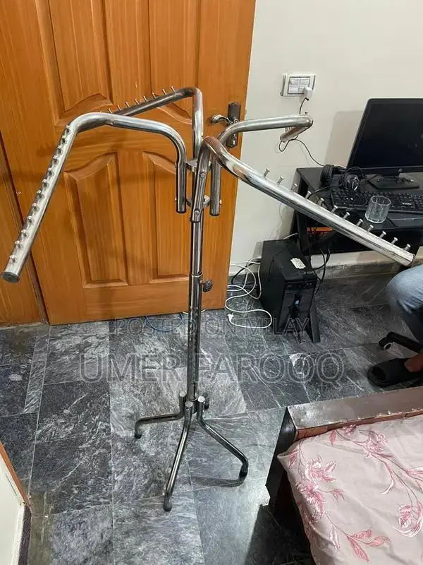 Adjustable Metal Clothes Hanger Stand - Home Storage Solution