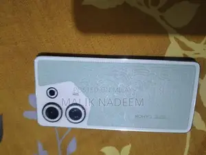 Cell Phone with Charger and Original Box in Pristine Condition