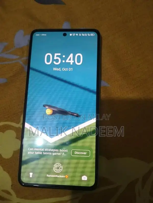 Cell Phone with Charger and Original Box in Pristine Condition