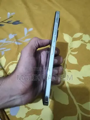 Cell Phone with Charger and Original Box in Pristine Condition