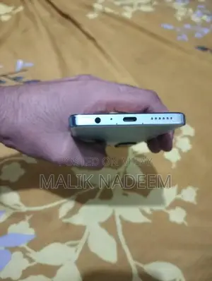 Cell Phone with Charger and Original Box in Pristine Condition