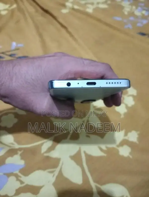 Cell Phone with Charger and Original Box in Pristine Condition