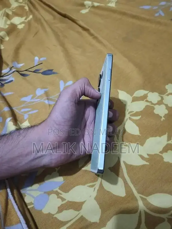 Cell Phone with Charger and Original Box in Pristine Condition