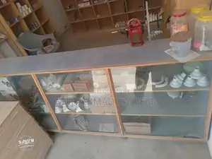 Photo - 5 Racks, 1 Showcase and 1 Table