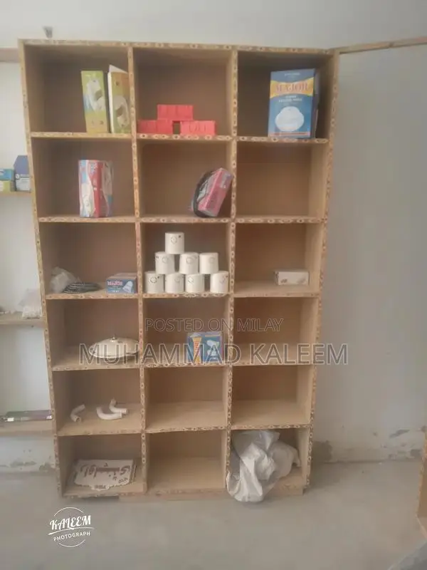 5 Racks, 1 Showcase and 1 Table