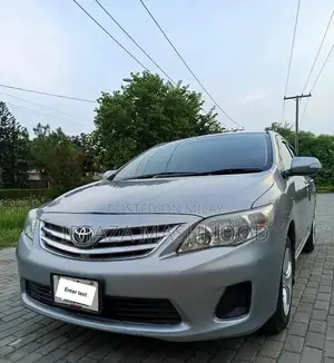 Photo - Toyota Corolla GLI 1.6 Automatic Sedan