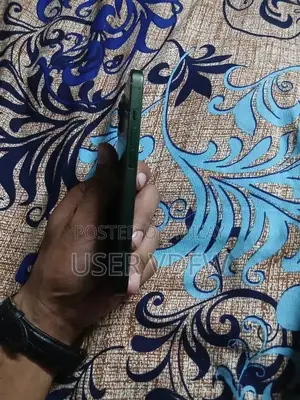 Photo - I phone 13jv waterpack  128gb context WhatsApp