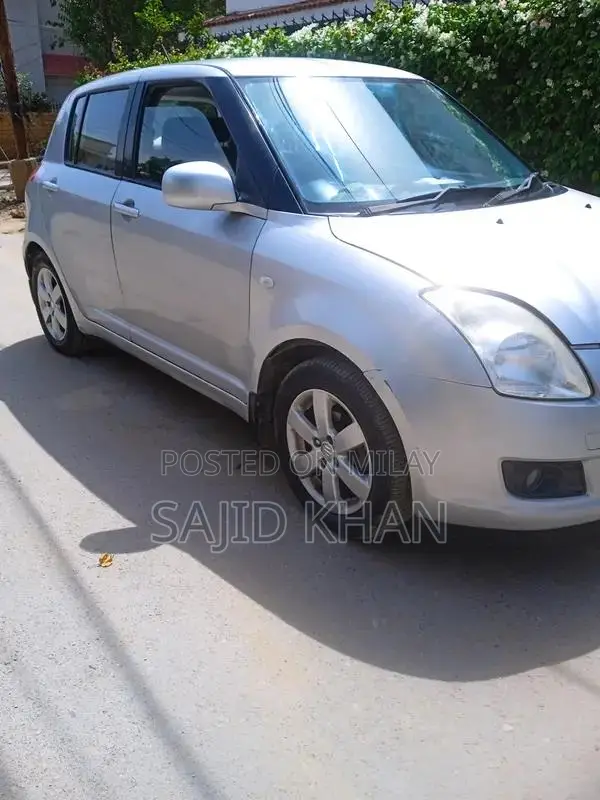 Swift Car with Alloy Rims and Air Conditioning
