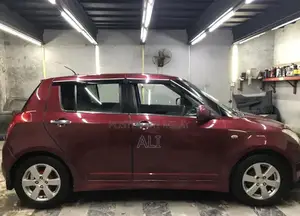 Swift 1.3 DLX Hatchback with Premium Upgrades