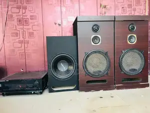 Photo - 2 speakers 12 inch and Amplifier with installed Bluetooth kit