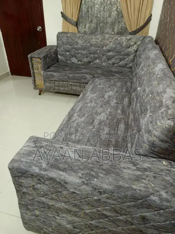 6 Seater L shape  sofa  Good condition Gray Color