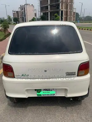 Photo - Daihatsu Cuore 2008 White Hatchback - Low Mileage Compact Car