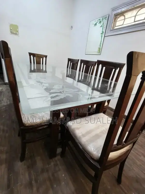 8 Chairs with dinning table