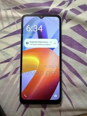 Redmi A2+ Smartphone with Cracked Screen