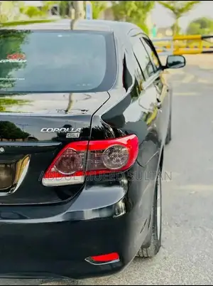 Toyota Corolla Gli Sedan - Low Mileage Black Sedan