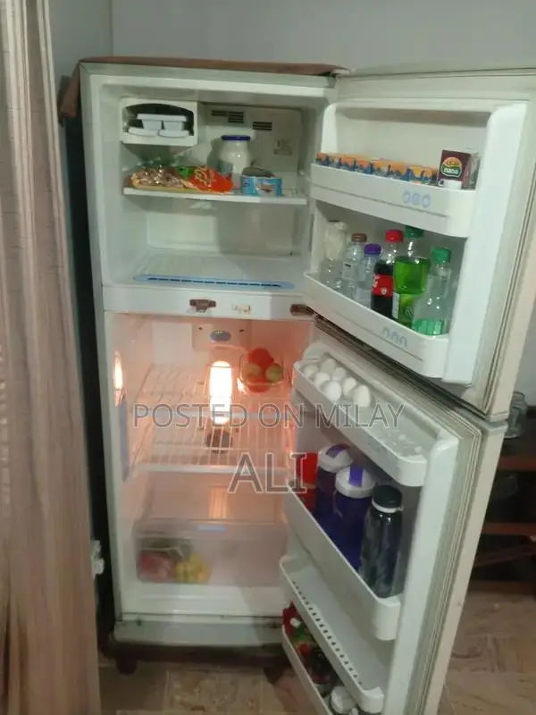 Large LG Refrigerator - Spacious and in Good Condition