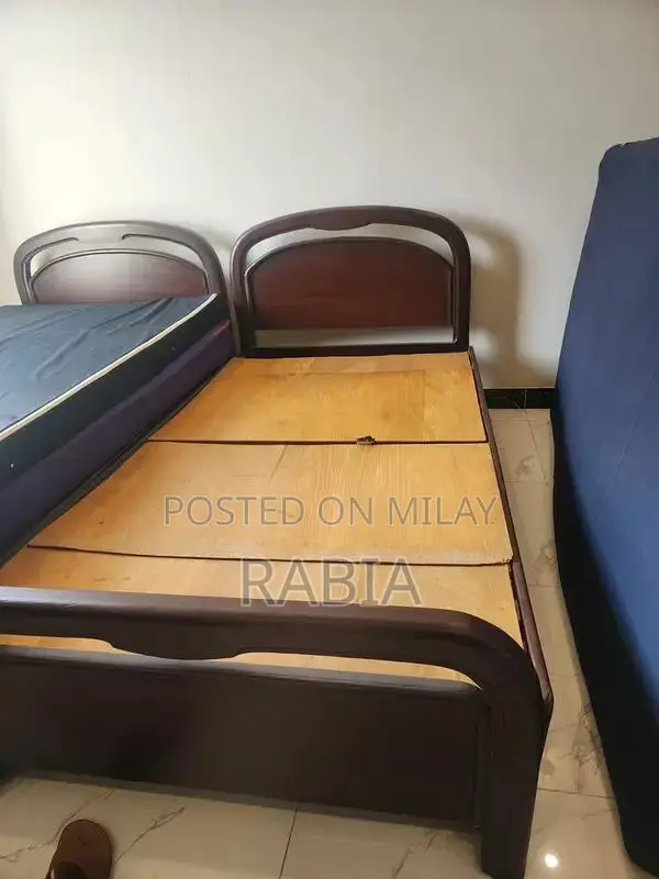 2 Single Solid Beds in Wooden